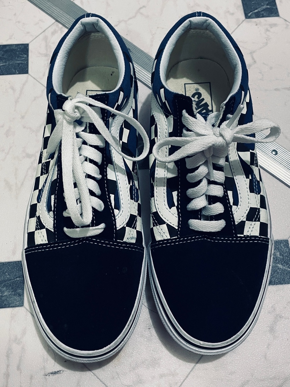 Blue and white pattern suede vans